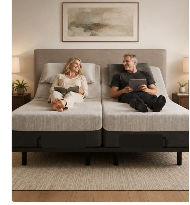 Couple relaxing on a Split King adjustable bed with both bases together